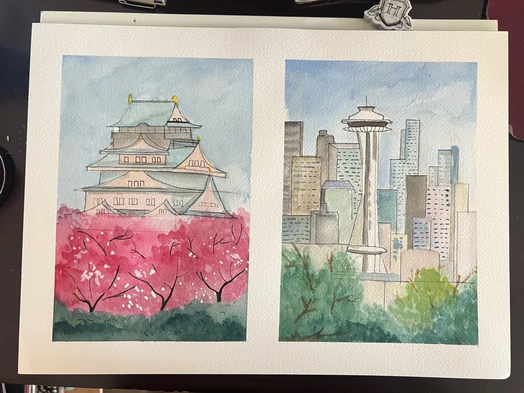 Two watercolor panels of Osaka Castle with cherry blossoms and the Seattle skyline